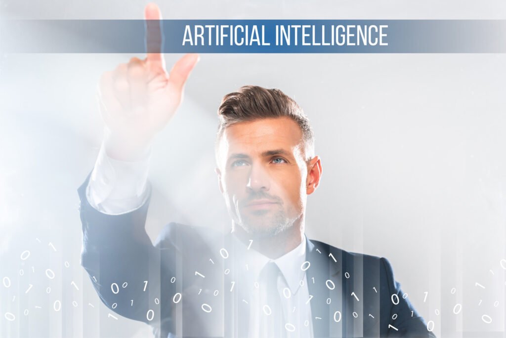 A man in a suit engages with a virtual interface, pointing forward. The text Artificial Intelligence appears above, symbolizing the rise of AI in the workplace, as digital binary code elements dance in the foreground.