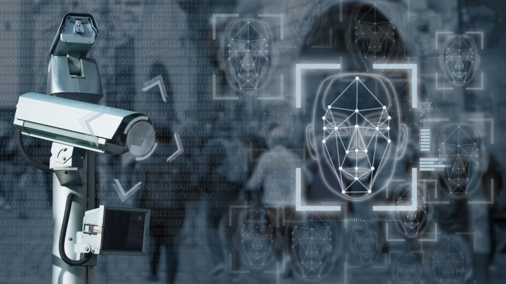 A surveillance camera focuses on digital renderings of faces with geometric patterns, hinting at facial recognition technology, while blurred figures linger in the background. This scene underscores the importance of devops security in managing and safeguarding advanced tech solutions.